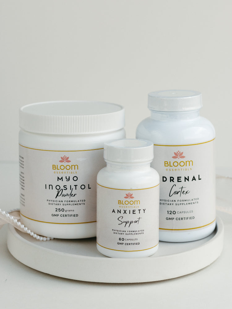Three bottles of supplements together.
